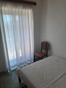 Postel nebo postele na pokoji v ubytování Villa Avli