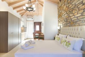 Ένα ή περισσότερα κρεβάτια σε δωμάτιο στο Pietra e Mare