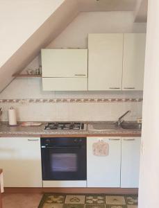 Kuchyňa alebo kuchynka v ubytovaní Casa Batella + 1 fotografia