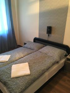 Posteľ alebo postele v izbe v ubytovaní Stella Apartman