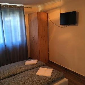 Posteľ alebo postele v izbe v ubytovaní Stella Apartman