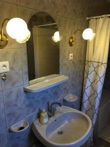 Kúpeľňa v ubytovaní Stella Apartman
