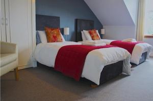 מיטה או מיטות בחדר ב-Rooms by No2 Troon Road