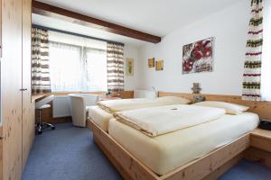 Postel nebo postele na pokoji v ubytování Hotel Silberdistel