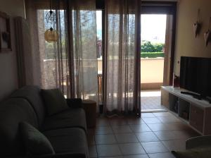 A television and/or entertainment centre at HOME DI CRISTINA