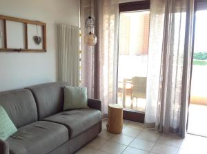 A seating area at HOME DI CRISTINA