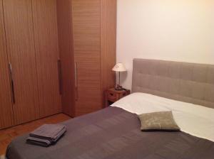A bed or beds in a room at HOME DI CRISTINA