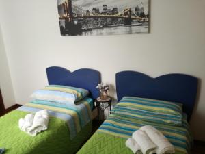Кровать или кровати в номере Casa Lory