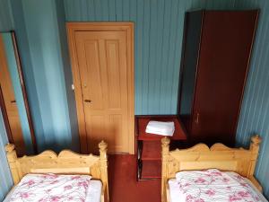 Letto o letti in una camera di Guesthouse Gamli Bær