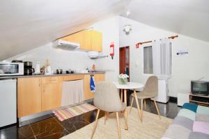 A kitchen or kitchenette at Casa Maria