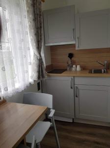 Kuchyň nebo kuchyňský kout v ubytování Cozy Room,Private Bathroom,Private Kitchynete + 7 fotografií
