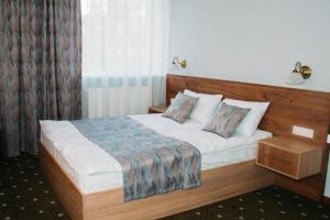 Postel nebo postele na pokoji v ubytování RioRo