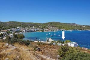 a view of a bay with boats in the water at Oneiro glico in Agia Marina Aegina