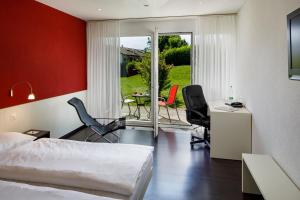 TV a/nebo společenská místnost v ubytování Hotel Stalden