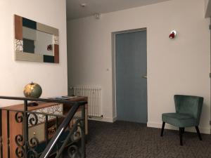 תמונה מהגלריה של Cit'Hotel Atlantis ברויאן