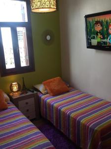 Posteľ alebo postele v izbe v ubytovaní Heavens Garden House