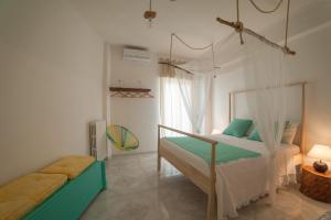 Postel nebo postele na pokoji v ubytování Casa d'aMare