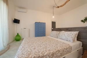 Postel nebo postele na pokoji v ubytování Casa d'aMare