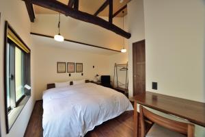 A bed or beds in a room at Kyoto - House / Vacation STAY 43530