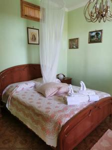 Posteľ alebo postele v izbe v ubytovaní HOUSE ROMINA