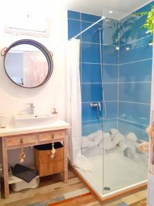 a bathroom with a shower and a sink at Los Ancones Apartment in Costa Teguise