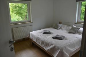 Postel nebo postele na pokoji v ubytování Apartmaji Gaby