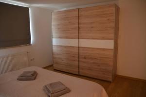 Postel nebo postele na pokoji v ubytování Apartmaji Gaby