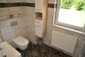 Koupelna v ubytování Apartmaji Gaby