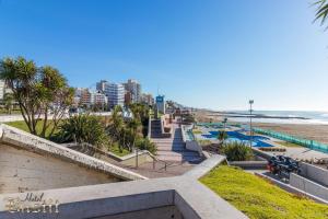 a view of the beach and the ocean at Hotel Bastit in Mar del Plata