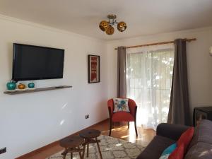 TV a/nebo společenská místnost v ubytování Apartamento La Calera