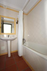 Koupelna v ubytování Casa da Arvore