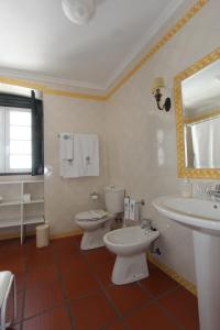 Koupelna v ubytování Casa da Arvore