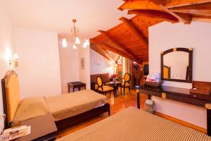 Postel nebo postele na pokoji v ubytování Krikonis Hotel + 37 fotografií