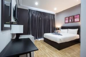 Wixky hotel客房内的一张或多张床位