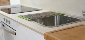 Kuchnia lub aneks kuchenny w obiekcie Apartamentos Antares 2