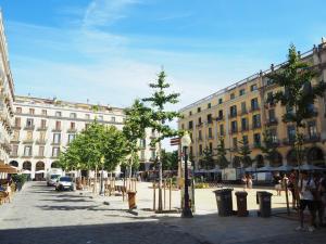 a street in a city with a large building at Old Side Girona One in Girona