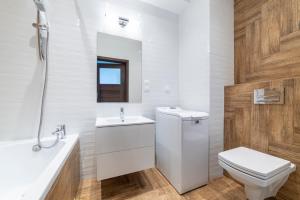 Kúpeľňa v ubytovaní Apartament Jaskółcza 30