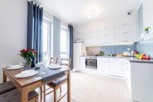 Kuchyňa alebo kuchynka v ubytovaní Apartament Jaskółcza 30