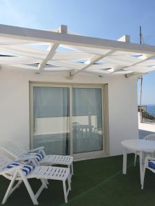 Balkón alebo terasa v ubytovaní Una Terrazza sul Mare The Lighthouse