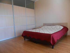  Кровать или кровати в номере Apartment Parallelnaya 9 