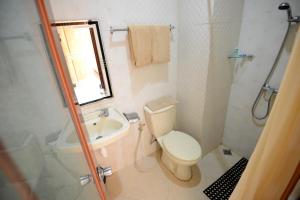Koupelna v ubytování Hotel Graha DPT 33