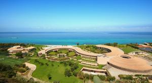 an aerial view of a park with the ocean at Capovaticano Resort Thalasso Spa in Capo Vaticano