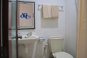 Koupelna v ubytování Hotel Graha DPT 33