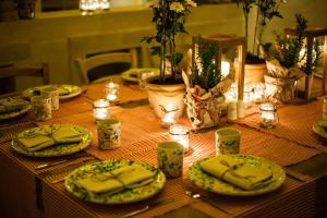 a table with plates of food on top of it at Borgo Egnazia in Savelletri di Fasano
