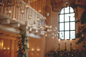 a room with a bunch of chandeliers and a window at Borgo Egnazia in Savelletri di Fasano