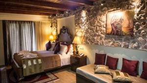 Posteľ alebo postele v izbe v ubytovaní Archontopetra Boutique Hotel
