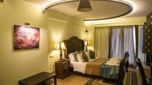 Posteľ alebo postele v izbe v ubytovaní Archontopetra Boutique Hotel