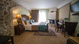 Posteľ alebo postele v izbe v ubytovaní Archontopetra Boutique Hotel