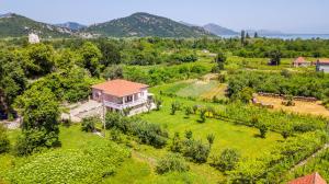 an aerial view of a house in a vineyard at House Gorica in Bar