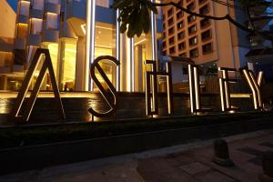 a sign that says rave in front of a building at Ashley Wahid Hasyim Jakarta in Jakarta